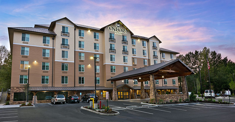 Photo of the front of the Oxford Suites hotel in Bellingham, WA.
