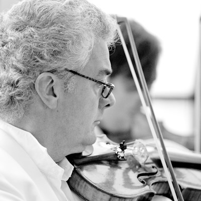 Black and white photo of Victor Costanzi playing the violin