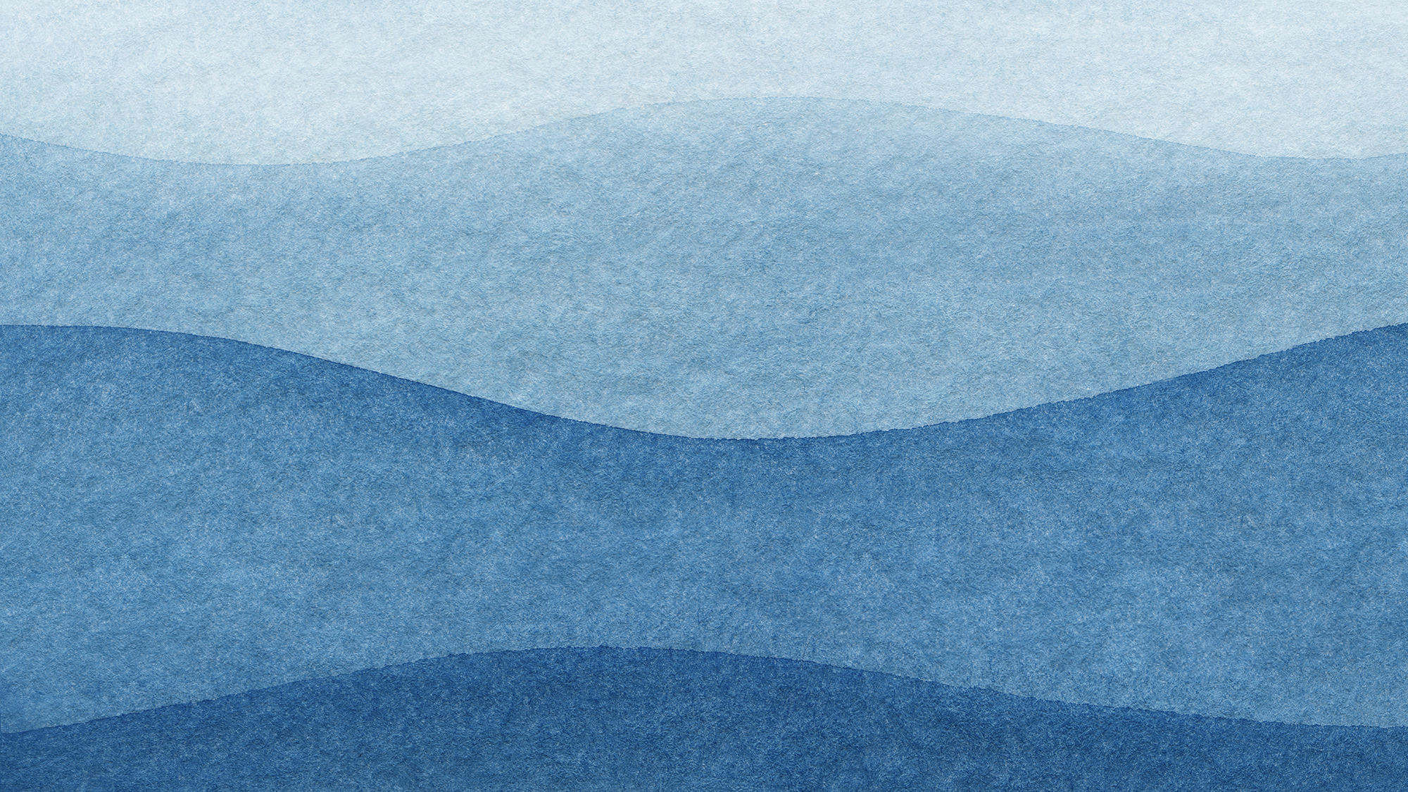 Graphic image of various shades of textured blue waves.