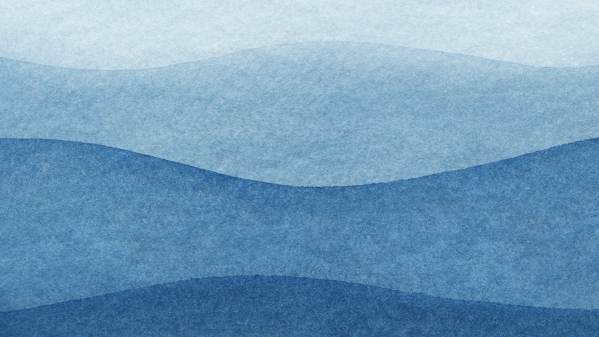 Graphic image of various shades of textured blue waves.