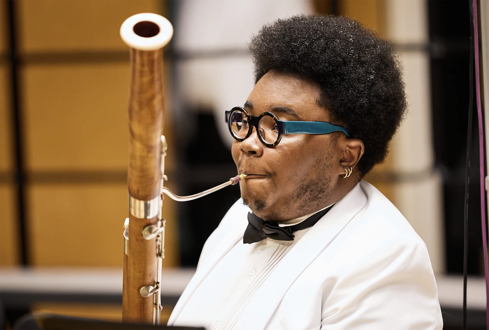 Photo of an orchestra member playing the bassoon.