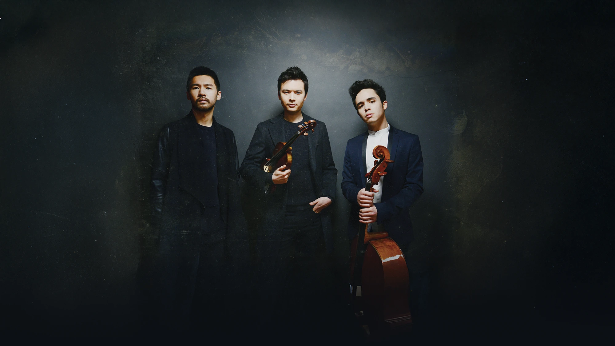 Save the date promotional graphic for The Junction Trio concert at the Bellingham Festival of Music, part of the Sanford Hill Piano Series, scheduled for Saturday, February 21, 2026, at 7:30 p.m. at the WWU Performing Arts Center. Image features the three Junction Trio musicians holding their instruments against a dark background.