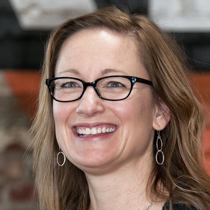 Photo of board member Elizabeth Hampton smiling.