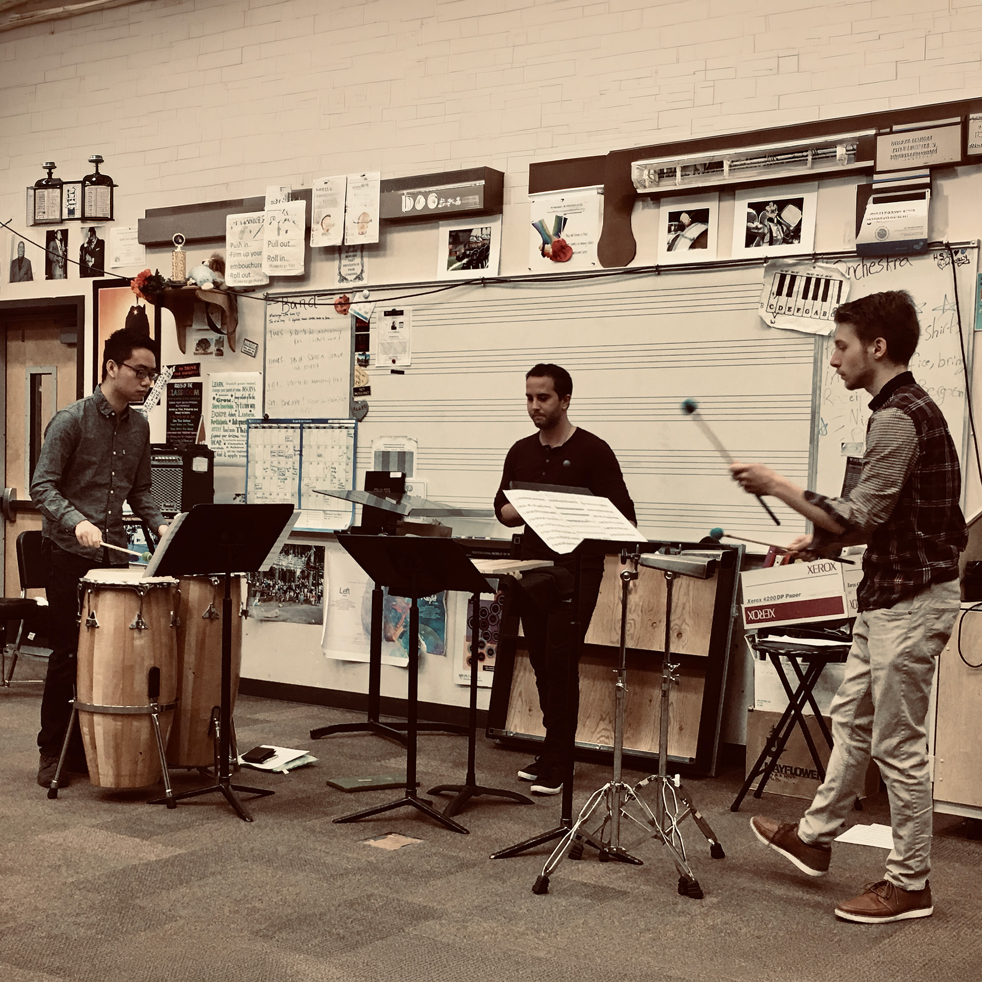 Ensemble percussionists in a dynamic rehearsal session for the Colburn Beat, showcasing collaborative music education.