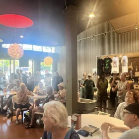 A crowd of community members gathered inside Mallard Ice Cream for a live musical performance in Bellingham.